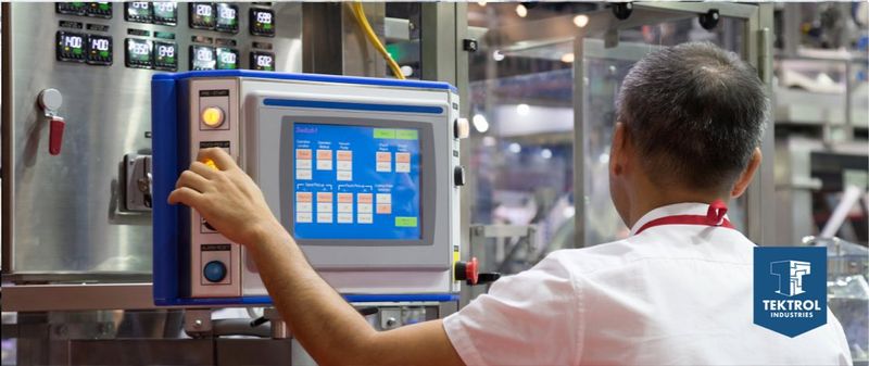 Technician working on a control panel